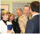  Picture: Admiral and Mrs. Mullen with Dr. Kondziolka.		


